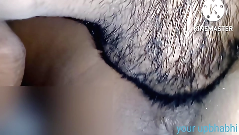 Girl in black stockings is showing off on a webcam video