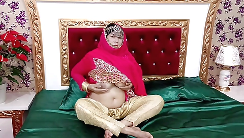 Sexy mature woman in her wedding dress makes love with a dildo