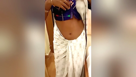 Busty indian harpoine wears hot saree in front of friends friends