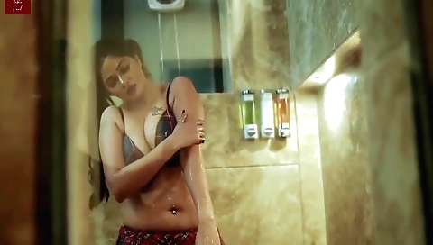 Brunette with sexy body and natural curves is in kitchen