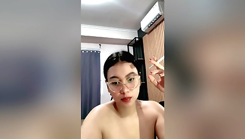 A cute little brunette 18+ girl enjoys her bathroom