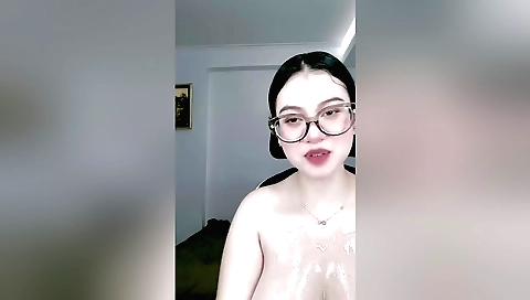 Indian brunette naked in the kitchen in front of the camera