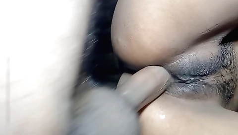 Hairy girl with a fat booty is getting fucked with a dildo