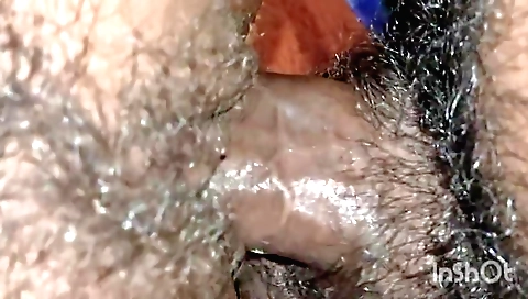 Indian babe with hairy bush gets fucked by a dildo