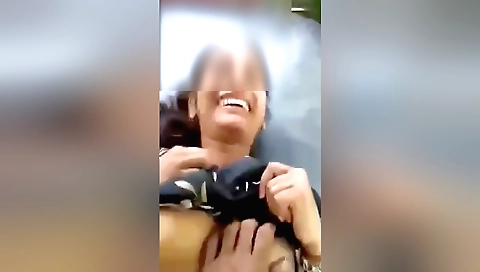 Indian girl plays with a toy and then a small toy inside her mouth