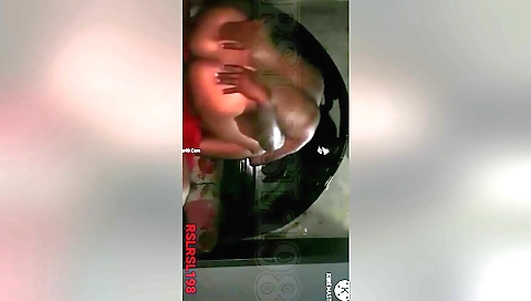 Busty Indian babe gives a handjob to her boyfriend