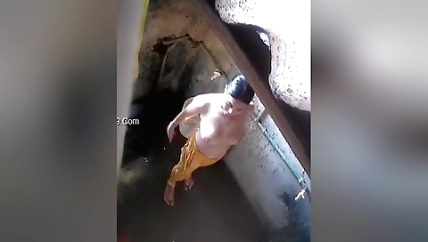 Sexy indian woman in a long skirt naked bed in the shower