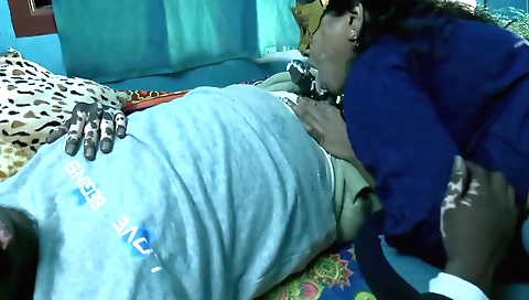 Indian porn video showing a brunette with big boobs