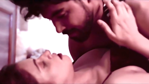 Red-haired salesman gets dressed up for the sale with her