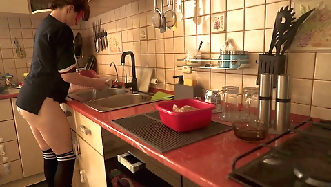 Sexy boobs in the kitchen with the maid preparing the foo