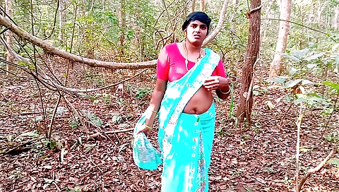Indian brunette fucked in the jungle by her stepmom