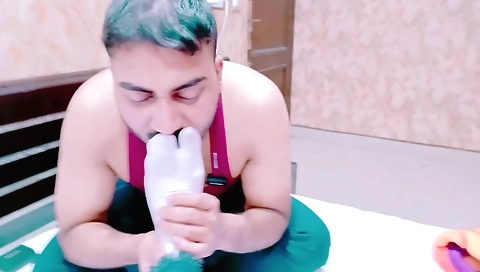 Sexy girl shows her feet licking a foot fetish doll