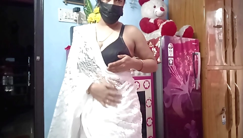 Indian mature woman in a sexy red saree plays with pussy