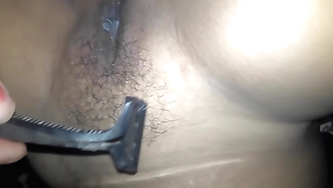 Hairy indian chick fucks on her own bed in amateur video