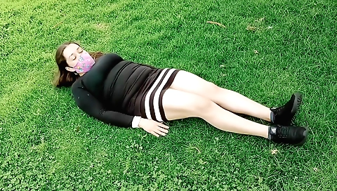 Amateur brunette naked in the park showing ass and pussy