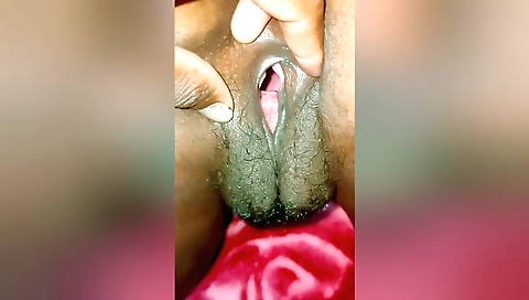 Indian girl is sucking on her hairy pussy in amateur porn 2d