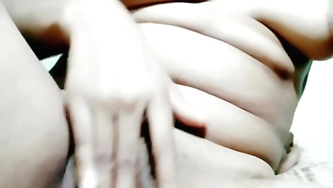 Amateur busty brunette with a hot body does a massage