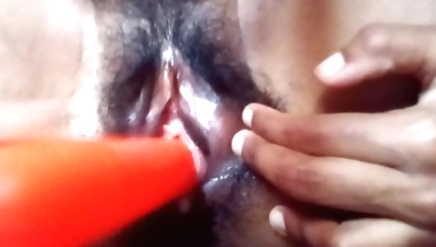 Indian housewife plays with her hairy pussy in solo porn video