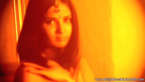 Indian brunette with a pair of sexy legs getting naked